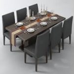 dining room table and 6 chairs set with dishes